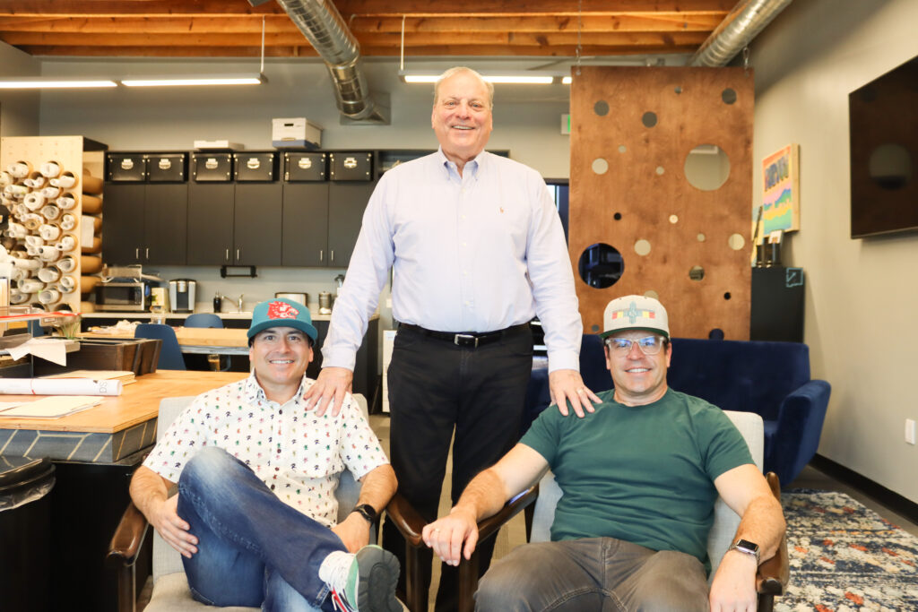 from left to right: David Silverman, Paul Silverman, and Adam Silverman in the Geltmore office.